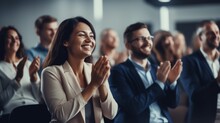 The Company's Employees Clap Their Hands As A Sign Of Success, Support, And Achievements. A Team Of Cheerful Smiling Multiethnic Group Of People Applauds At A Briefing, Meeting In The Office.