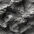 Grey crumpled paper texture abstract background