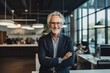 © Vorda Berge - Portrait of a mature businessman posing in modern office