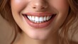 © Nico - Woman smiling with bright white teeth into the camera, clean teeth dentist