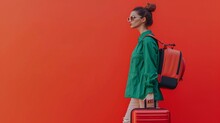 Side View Traveler Woman Wears Green Casual Clothes Hold Suitcase Bag Isolated On Plain Orange Red Background. Tourist Travel Abroad In Free Spare Time Rest Getaway. Air Flight Trip Journey Concept.