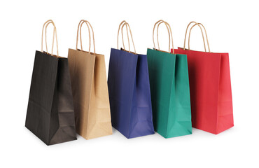 Wall Mural - Many paper shopping bags on light background