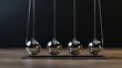 © Orxan - Newton's cradle physics concept for action and reaction or cause and effect. Balls Newton