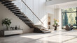 An elegant floating staircase with white marble steps and a thin black metal railing. The design exudes sophistication and simplicity, adding a touch of modern luxury to a well-lit foyer