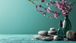 Essential oil with stones and cherry blossoms