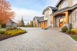cobblestone driveway leading to luxury home