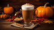 pumpkin spice latte in a rustic autumn themed indoor cafe with pumpkin on the background