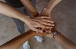© SASITHORN - The hands team together with a partnership team Joining trust and successful Concept
