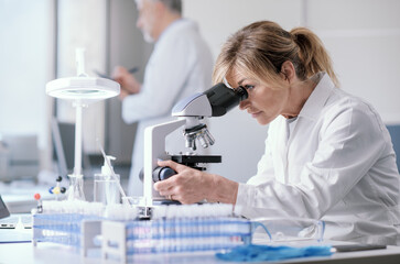 Wall Mural - woman working in a medical laboratory