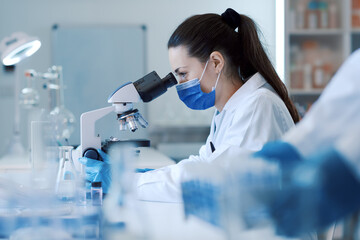 Wall Mural - confident scientist working in the science lab