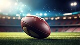 Fototapeta Sport - Rugby ball on stadium field with blurry stadium tribunes