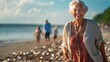 Smiling elderly woman walking on a beach with seashells and family in the background.