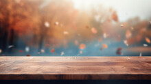 Empty Blank Wooden Table Fall Background With Autumn Trees Orange Yellow Color Leaves Backdrop Forest Or Park Nature Scene Abstract Blurred Bokeh Tabletop For Product Display Desk Mockup. Copy Space.