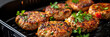 Air fryer view of turkey patties.