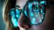 © standret - Data reflecting on eyeglasses on woman's face. Computrer programmer big data and ux designer concept