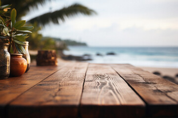 Wooden table ocean bokeh background, empty wood desk surface product display mockup with blurry sea water sunny beach abstract summer travel backdrop advertising presentation. Mock up, copy space.