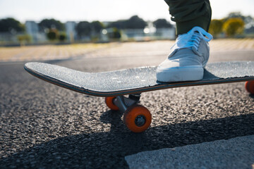 Wall Mural - Skateboarder skateboarding outdoors in city