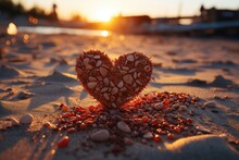 As The Sun Sets Over The Tranquil Beach, A Heart Shaped Rock Lies Nestled In The Sand, A Symbol Of Love And Nature's Beauty