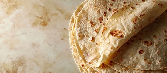 Wall Mural - Ham and cream cheese rolled up in a flour tortilla. Copy space image. Place for adding text