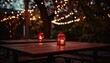 dining tables under a lights on a roof covered in trees