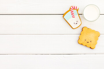 Wall Mural - Homemade funny biscuits with milk for kids, top view. Breakfast with milk