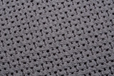 Fototapeta  - Struktura jasno szara tkanina z dziurkami w zbliżeniu makro