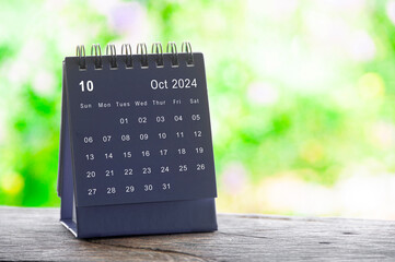 Wall Mural - October 2024 table calendar with nature background. Calendar and month concept