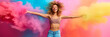Beautiful young joyful woman sprinkled with colored powder on a colored background