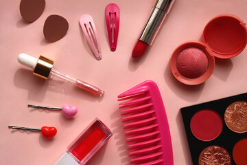 various pink accessories and make up products on bright pink background. flat lay.