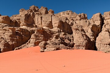 A view of the Ouan Atan rock formations in the Tadrart Rouge Mountains. Tassili n Ajjer National Park, Sahara Desert, Algeria, Africa.