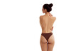 © Lustre Art Group  - Female healthy back. Rear view of sensual young woman with curvy figure posing in underwear against white studio background. Concept of beauty, body and skin care, health, plastic surgery