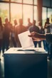 © Sasa Visual - Diverse hands voting at polling station as right to vote democracy holding blank decision document