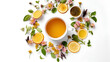 A cup of herbal tea with different ingredients on a white background. Organic floral, green Asian tea. View from above.