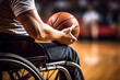 A man in wheelchair playing basketball