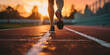 © RemsH - a runner's feet on the track