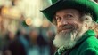 Man wearing green clothes participating in Saint Patrick's Day parade in Irish town