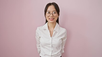 Sticker - Upbeat, confident, and lucky young chinese woman with glasses sports a cool, joyful smile over happy, pink background