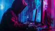 © Nelson - Cybersecurity breach concept with a hooded figure hacking a computer