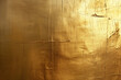 textured golden surface with various lines and cracks, creating a rustic and worn appearance that catches the light.