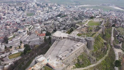 Wall Mural - Bird's eye view of Albanian city Gjirokaster. Gjirokaster castle visible from above.
