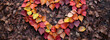 Gather colorful leaves and arrange them in a heart shape