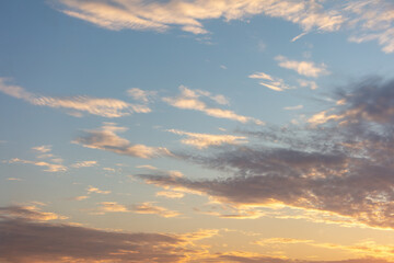 Wall Mural - Clouds in the sky at a colorful sunset