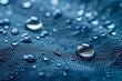 Nahaufnahme: Wassertropfen auf Textil