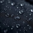 Nahaufnahme: Wassertropfen auf Textil