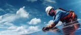 Fototapeta  - technician is installing solar panels during the day.bright blue sky background