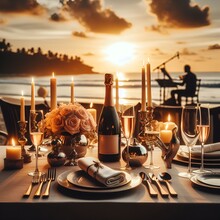  Glow Of Candlelight Reflects Off Of Sparkling Glassware And Polished Silverware, Creating A Warm And Inviting Atmosphere For An Evening Of Seaside Dining. 