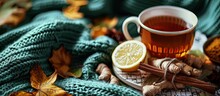 Cozy Autumn Breakfast With Tea Selective Focus Honey Cinnamon Sticks Lemon Ginger And A Warm Knitted Sweater On A Beige Mint Fabric. Creative Banner. Copyspace Image