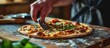 Close up of male hand slicing freshly baked pizza with round cutter wheel. Creative Banner. Copyspace image