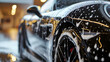 © john - Professional Car Wash black Sportscar with Shampoo close-up