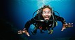 Scuba diver diving in deep blue sea. Funny man in scuba suit and mask.
